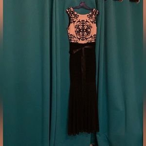 Beautiful black and rose color dress mermaid style pleated from the waist down